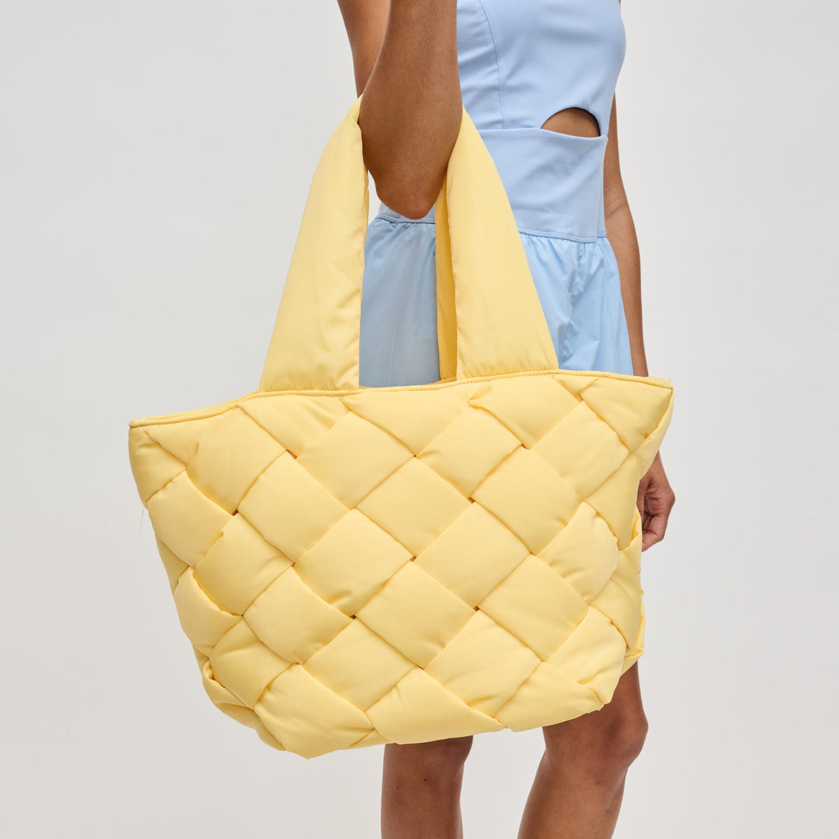 Woman wearing Butter Sol and Selene Intuition East West Tote 841764111836 View 1 | Butter