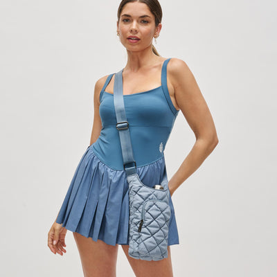 Woman wearing Slate Sky Sol and Selene Let It Flow - Puffer Crossbody 841764112093 View 1 | Slate Sky