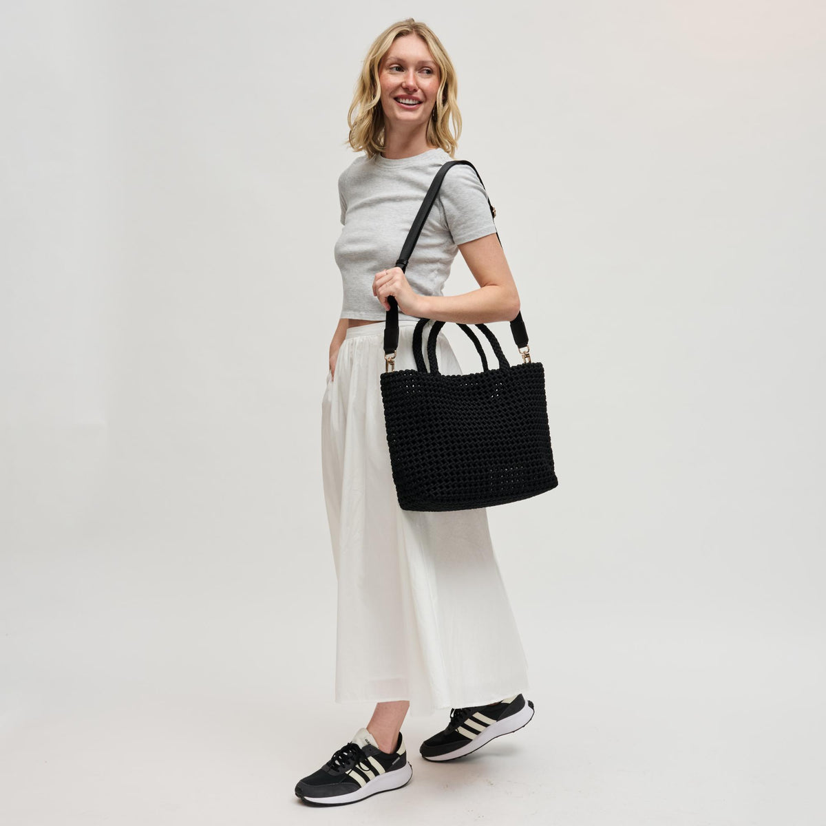 Woman wearing Black Sol and Selene Ambrosia Medium Tote 841764112734 View 3 | Black