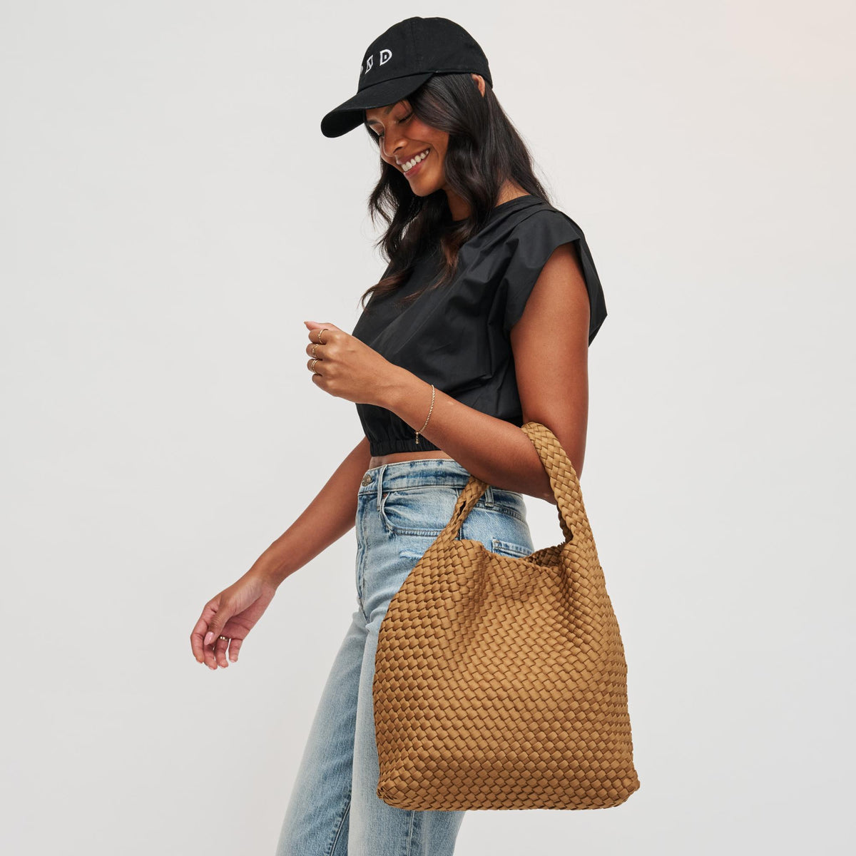 Woman wearing Sand Sol and Selene Celestial Woven Neoprene Hobo 841764112338 View 2 | Sand