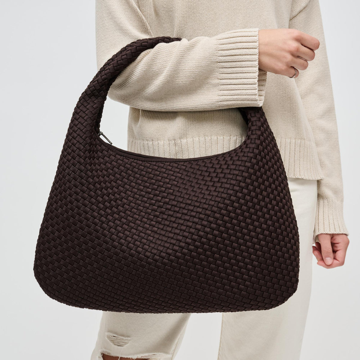 Woman wearing Chocolate Sol and Selene Dare to Dream - Large Woven Neoprene Hobo 841764110938 View 1 | Chocolate