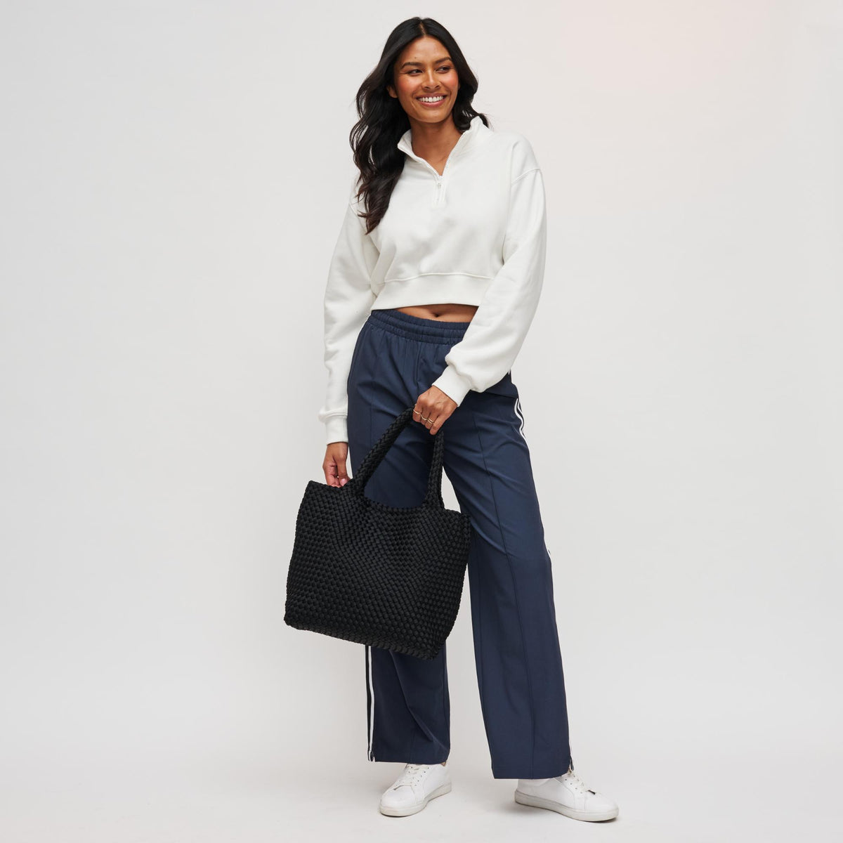 Woman wearing Black Sol and Selene Sky's The Limit - Medium Tote 841764107778 View 4 | Black