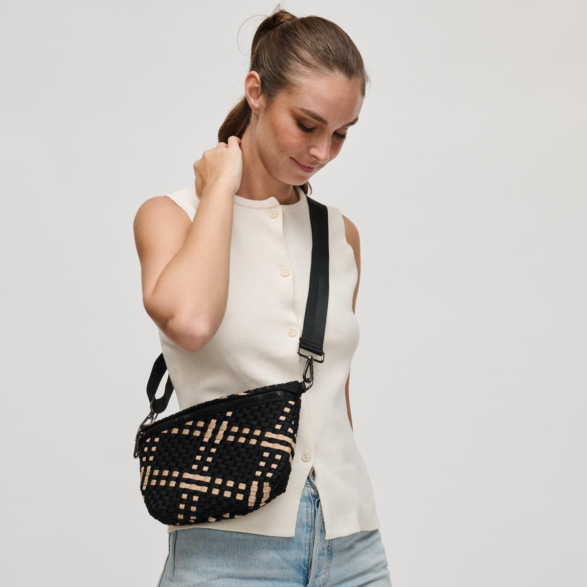 Woman wearing Black Nude Sol and Selene Ethereal - Woven Neoprene Crossbody 841764111768 View 4 | Black Nude