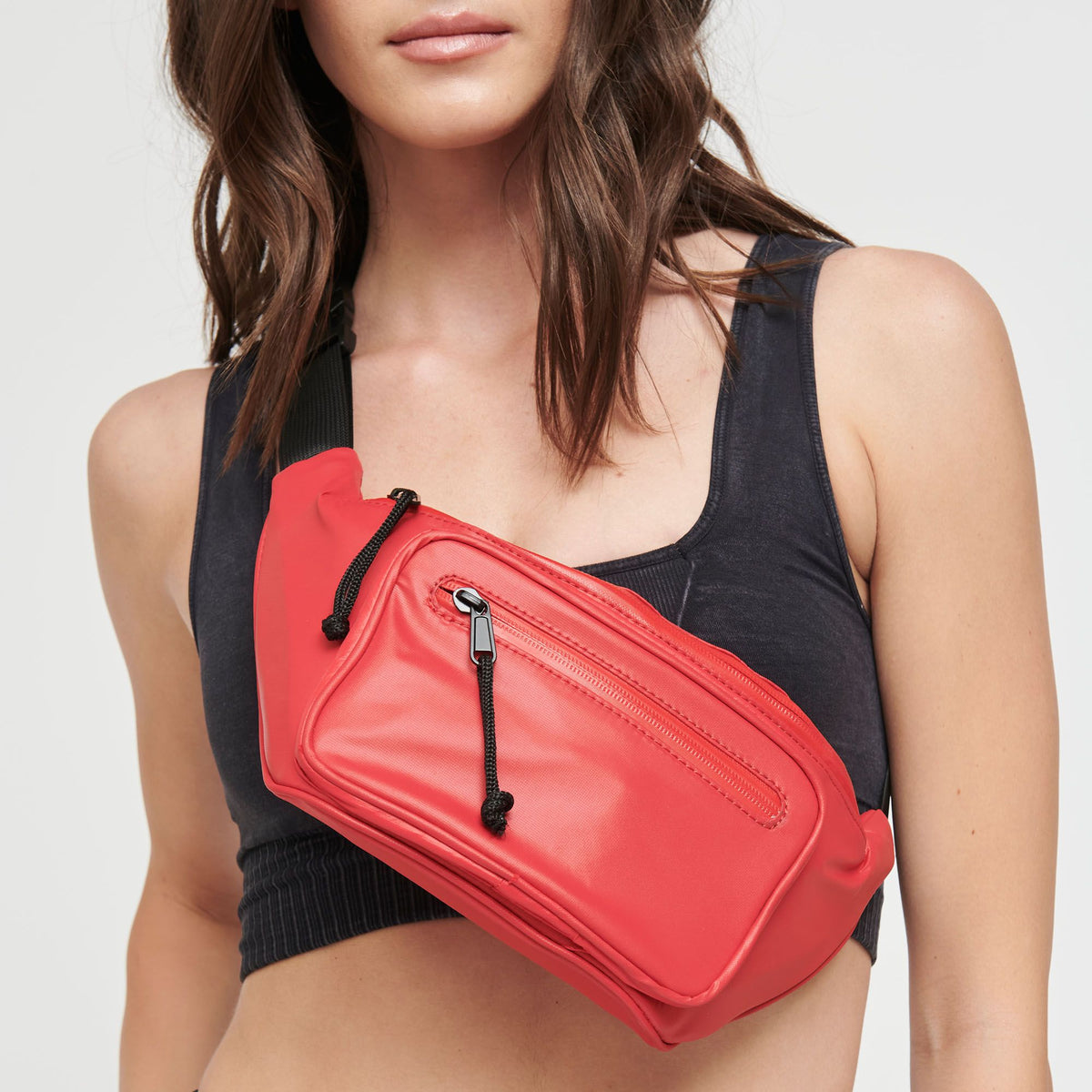 Woman wearing Bright Red Sol and Selene Hands Down Belt Bag 841764104234 View 1 | Bright Red