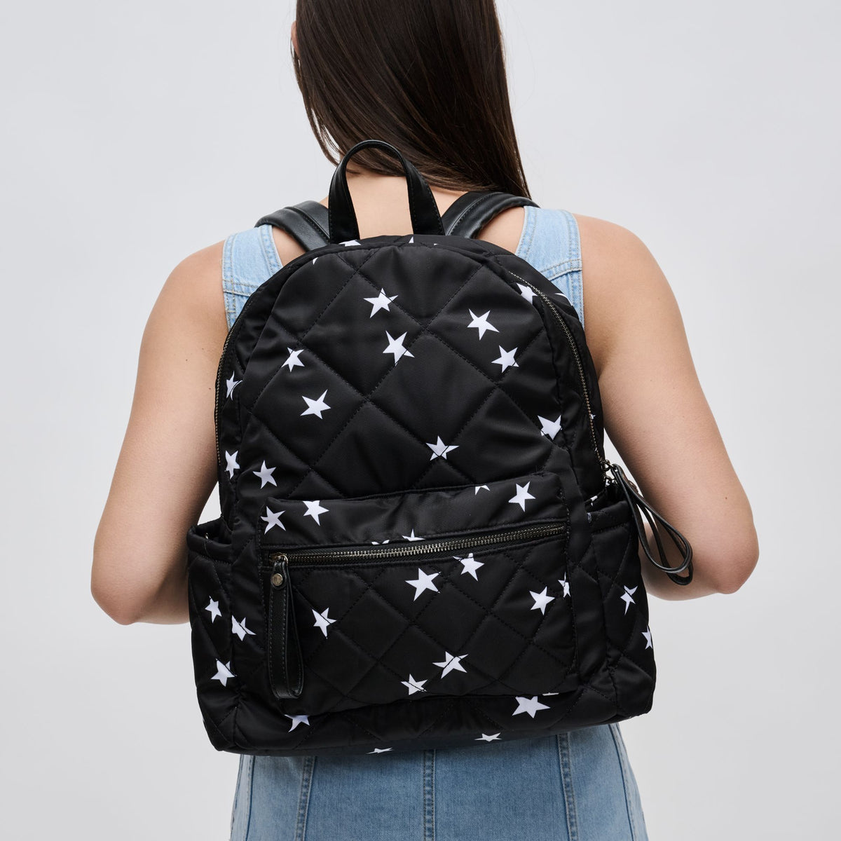 Woman wearing Black Star Sol and Selene Motivator - Medium Backpack 841764103138 View 2 | Black Star