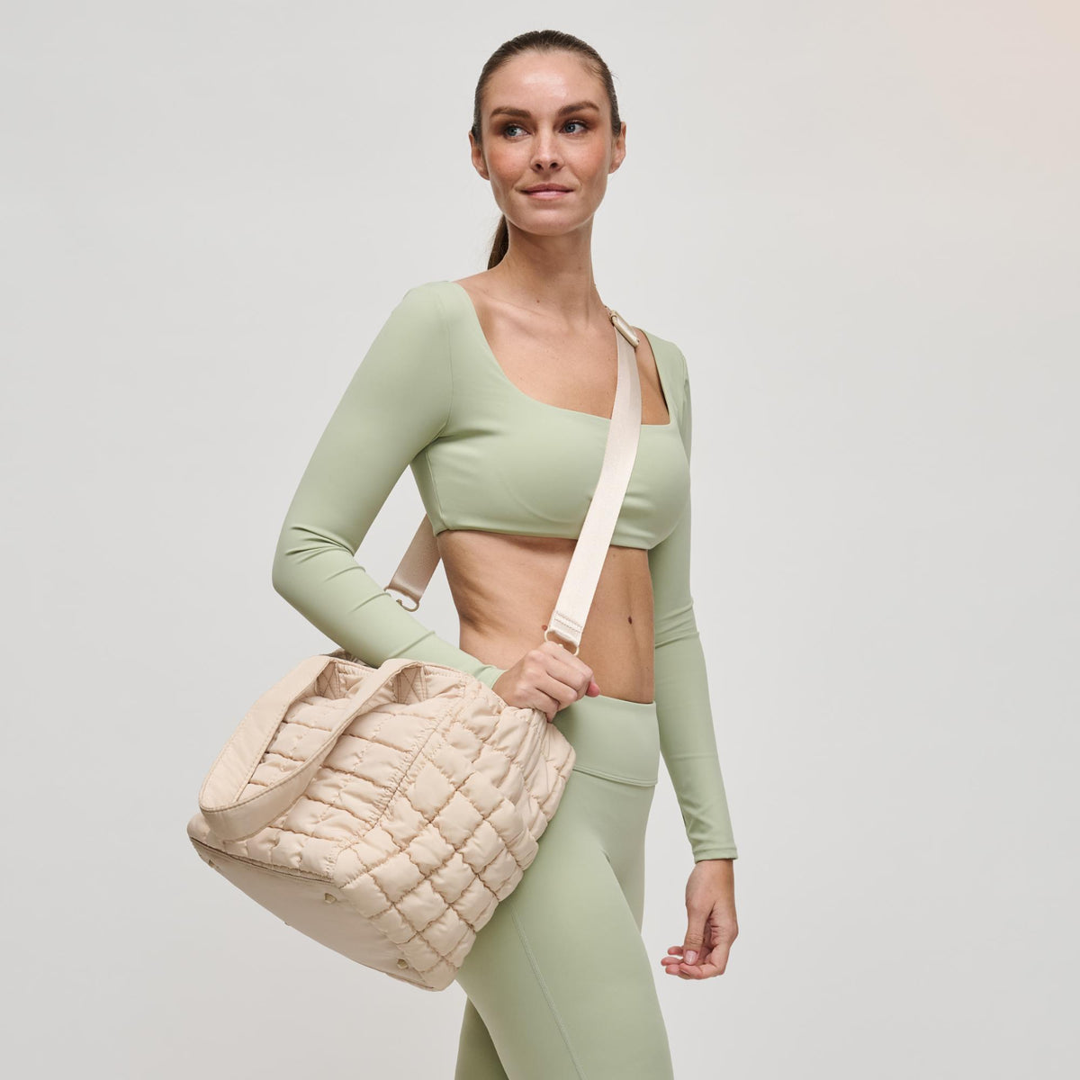 Woman wearing Cream Sol and Selene Dreamer Tote 841764109451 View 2 | Cream