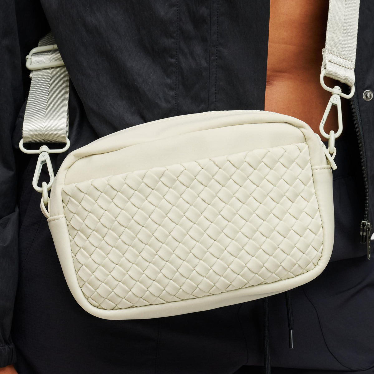 Woman wearing Bone Sol and Selene Inspiration - Woven Neoprene Crossbody 841764109215 View 4 | Bone