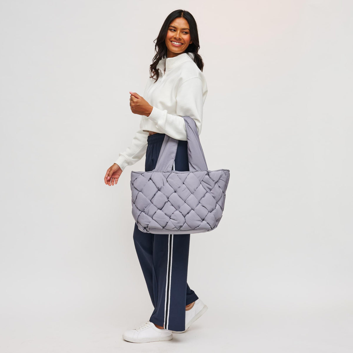 Woman wearing Carbon Sol and Selene Intuition East West Tote 841764107334 View 3 | Carbon