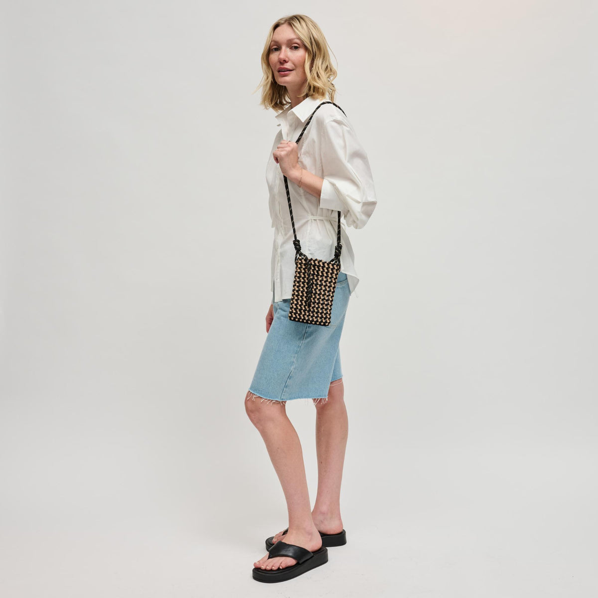 Woman wearing Black Nude Sol and Selene Eos Cell Phone Crossbody 841764113069 View 4 | Black Nude