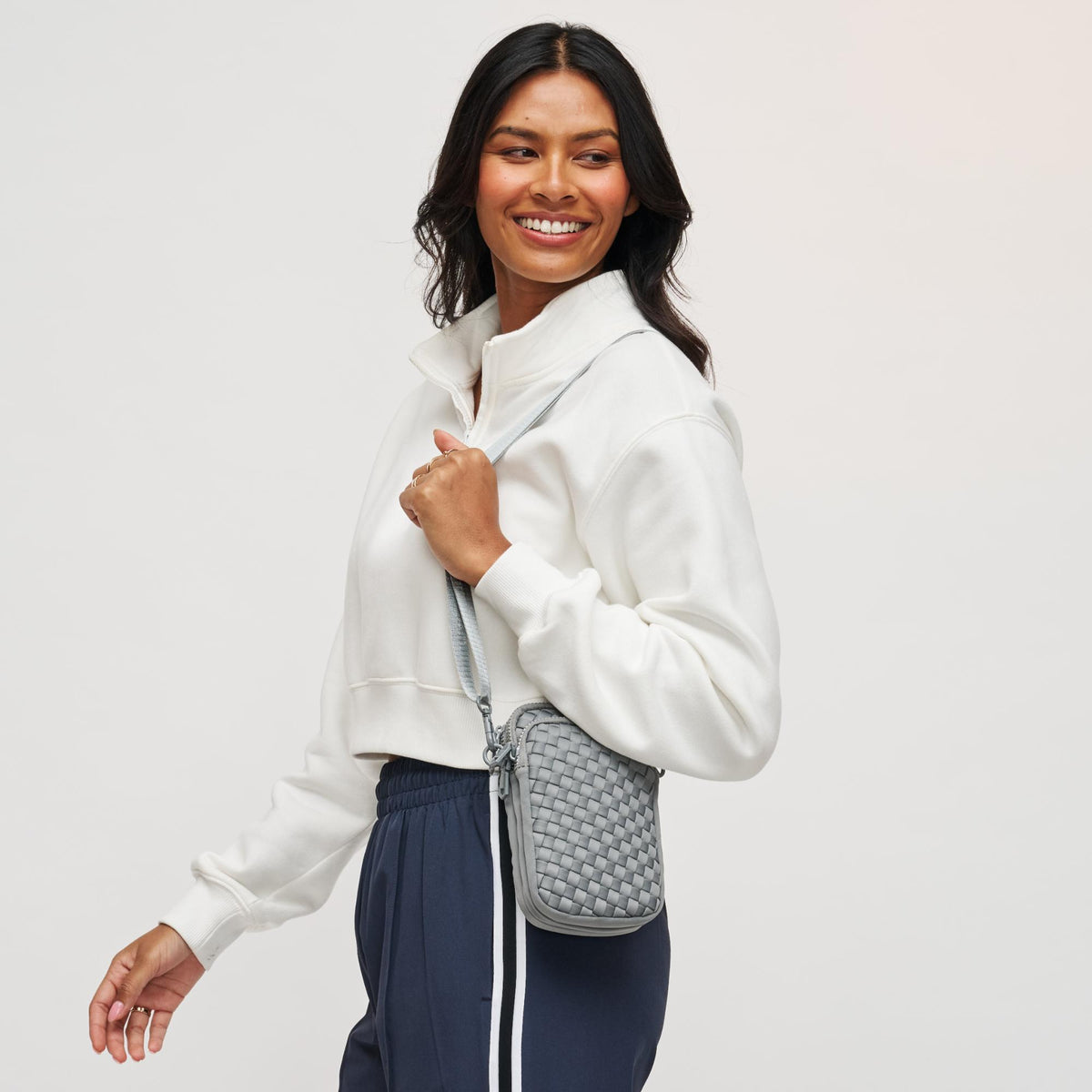 Woman wearing Grey Sol and Selene Divide & Conquer - Woven Neoprene Crossbody 841764108737 View 2 | Grey