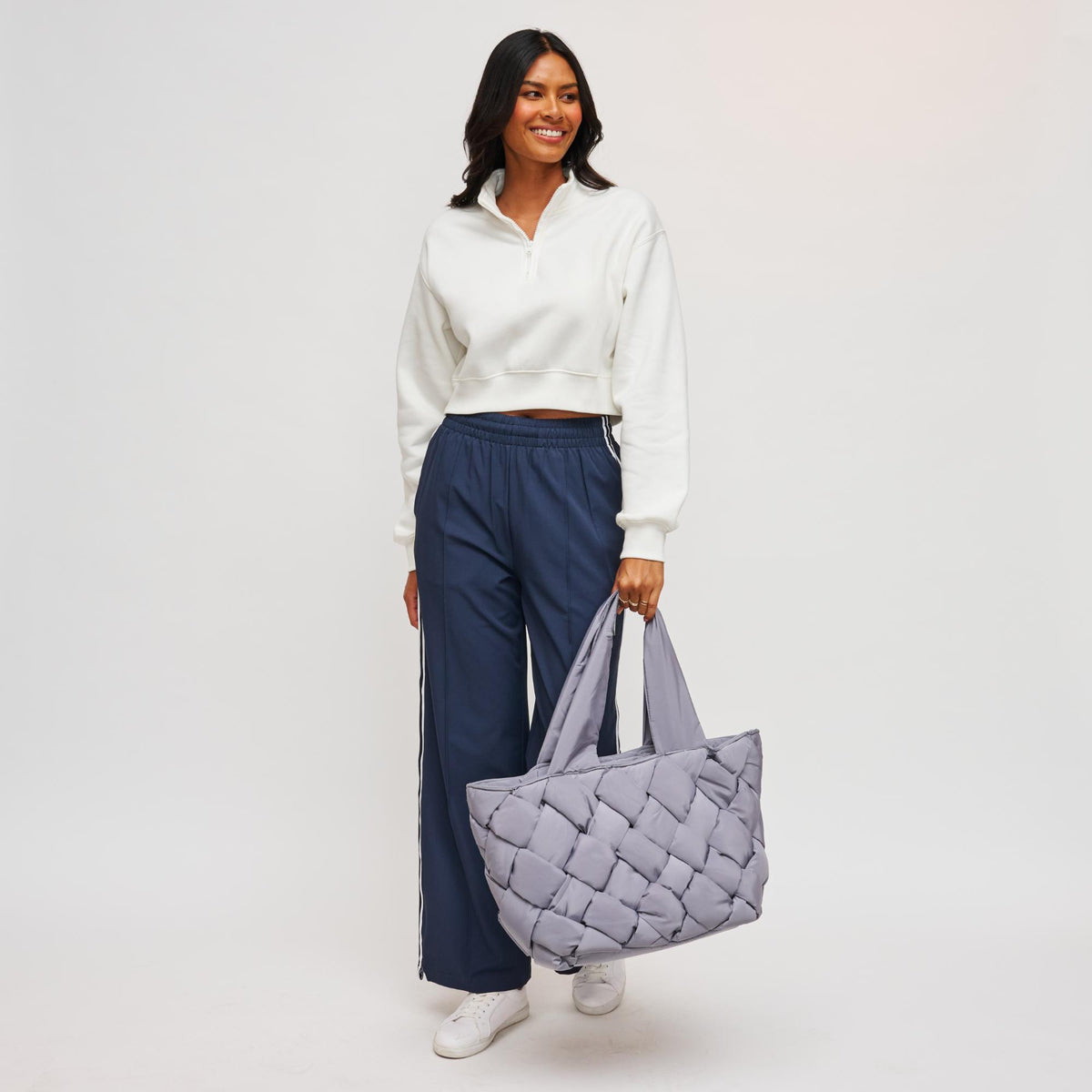 Woman wearing Carbon Sol and Selene Intuition East West Tote 841764107334 View 2 | Carbon