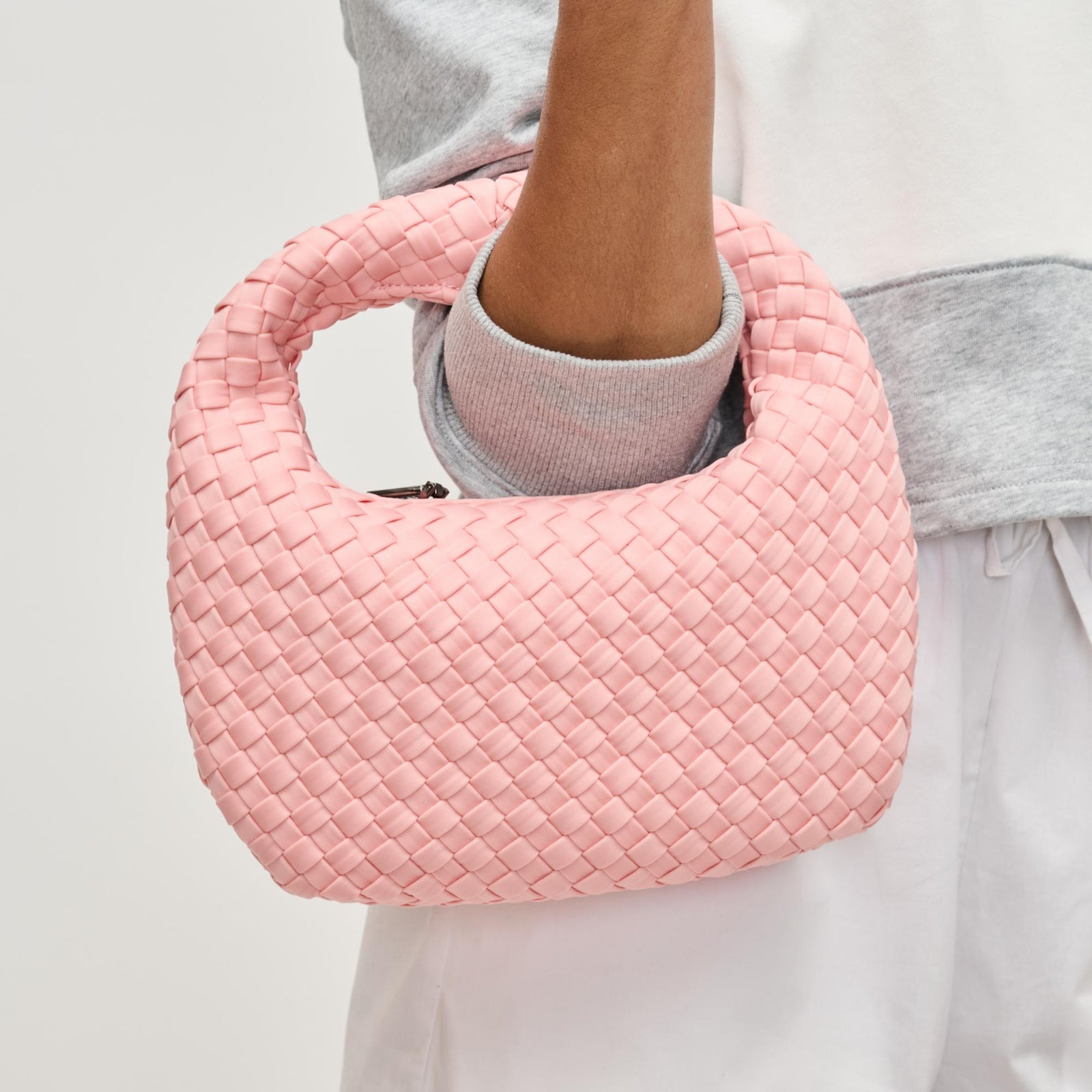 Woman wearing Black Sol and Selene Dare to Dream - Small Woven Neoprene Clutch 841764111072 View 1 | Black