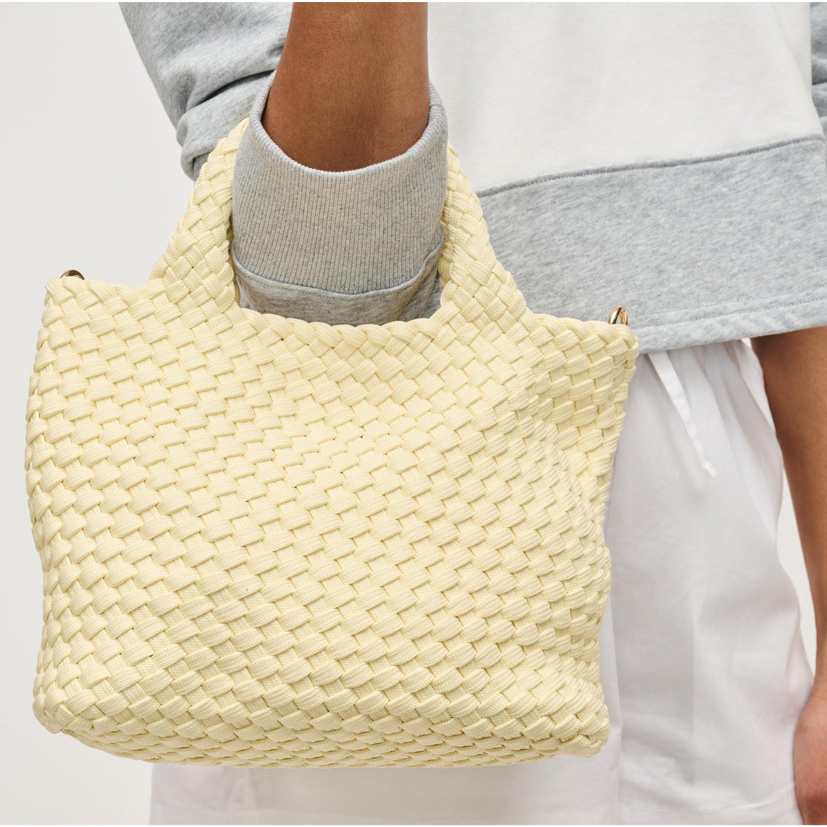 Woman wearing Butter Sol and Selene Sky's The Limit - Small Laced Up Eco-Edition Crossbody 841764111706 View 2 | Butter