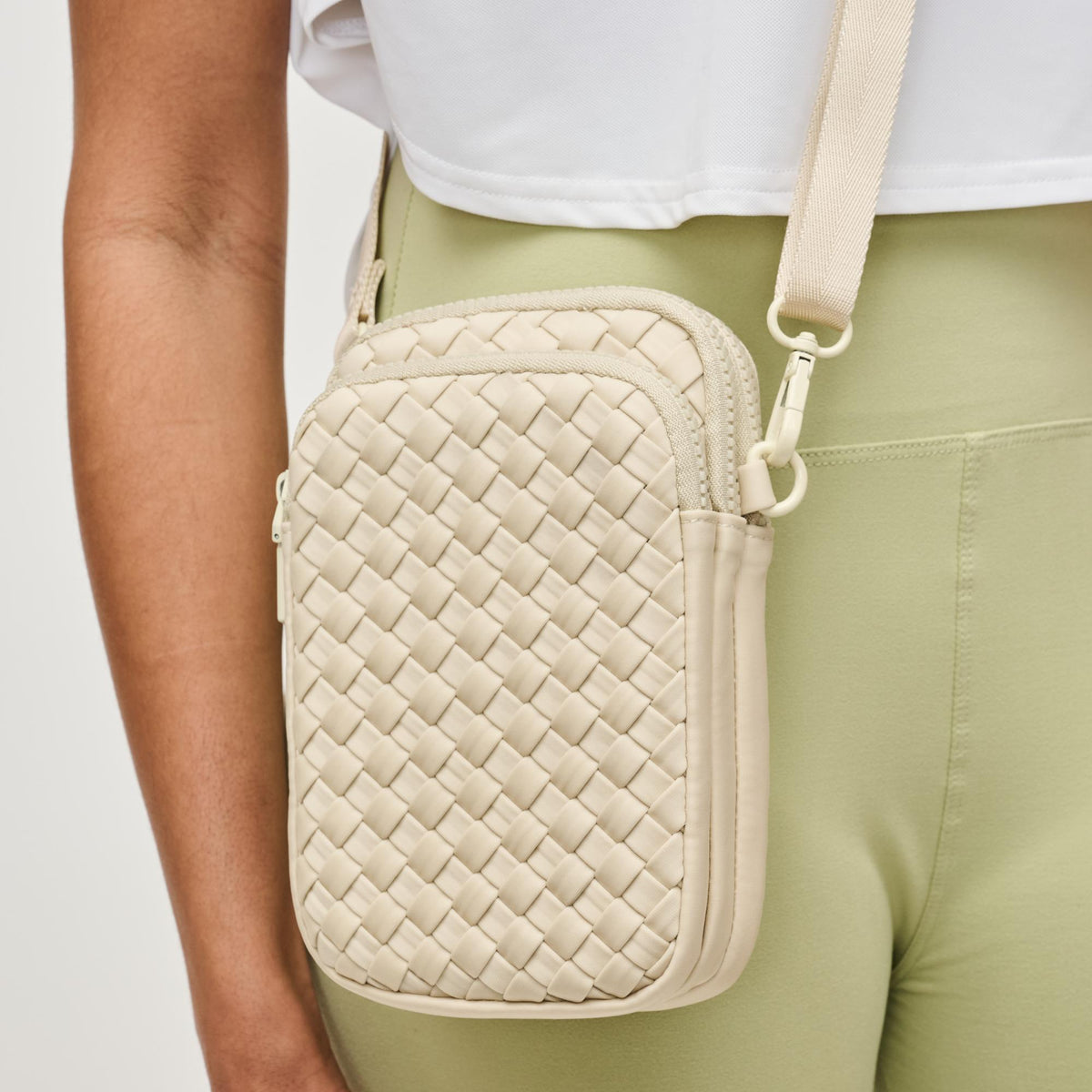 Woman wearing Cream Sol and Selene Divide & Conquer - Woven Neoprene Crossbody 841764109239 View 4 | Cream