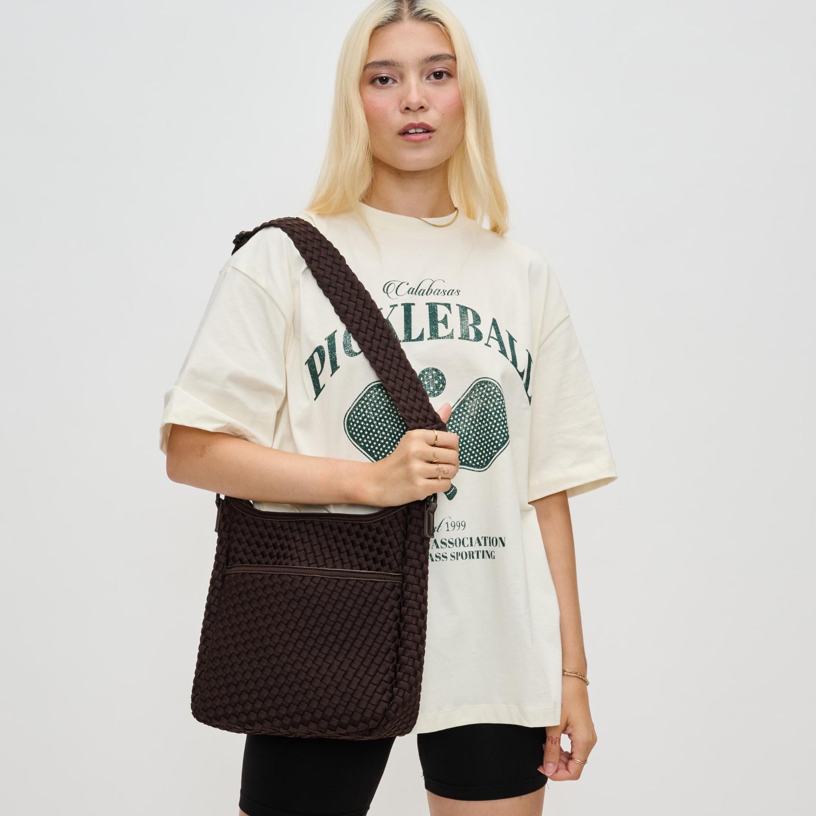 Woman wearing Black Sol and Selene Kismet - Woven Neoprene Crossbody 841764110143 View 1 | Black