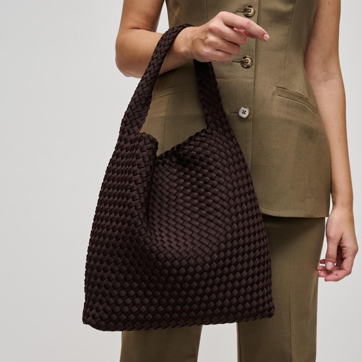 Woman wearing Chocolate Sol and Selene Celestial Woven Neoprene Hobo 841764112314 View 4 | Chocolate