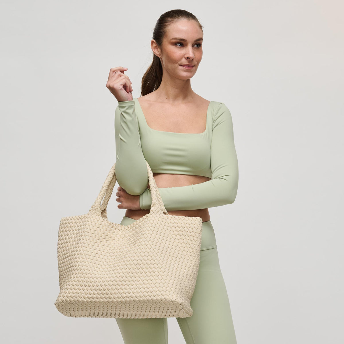 Woman wearing Cream Sol and Selene Sky's The Limit - Large Tote 841764109253 View 3 | Cream