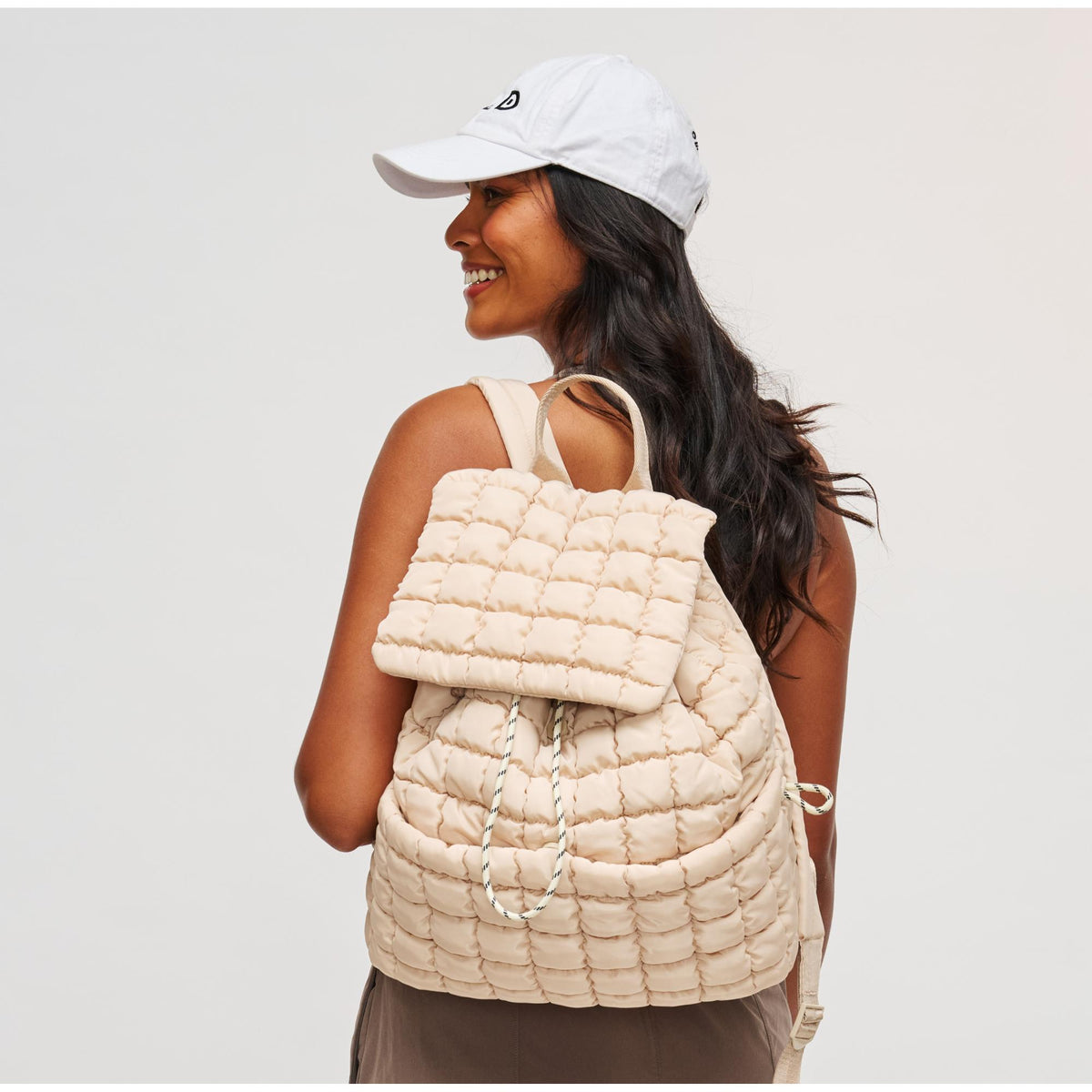 Woman wearing Cream Sol and Selene Vitality Backpack 841764109888 View 2 | Cream