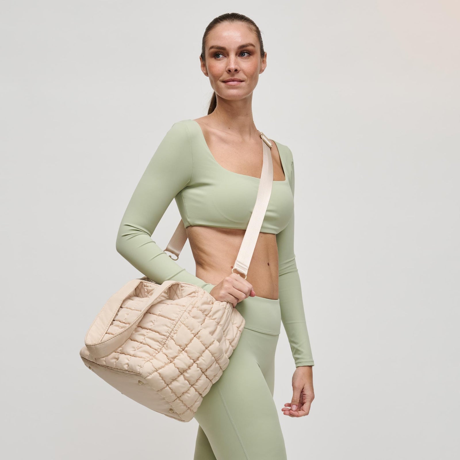 Woman wearing Cream Sol and Selene Dreamer Tote 841764109451 View 2 | Cream