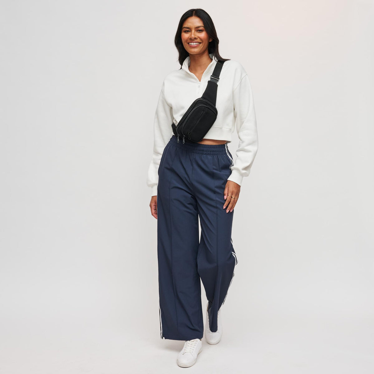 Woman wearing Black Sol and Selene Hip Hugger - Neoprene Mesh Belt Bag 841764109819 View 2 | Black