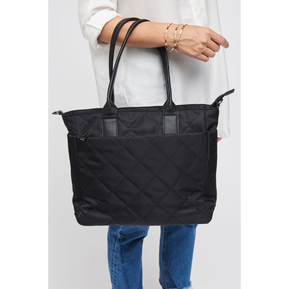 Woman wearing Black Sol and Selene Motivator East West Tote 841764105729 View 1 | Black