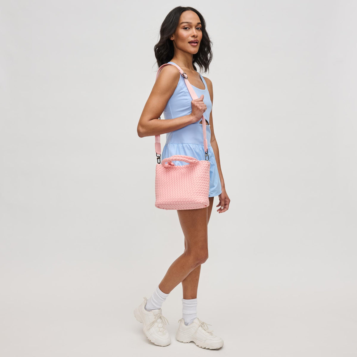 Woman wearing Blush Sol and Selene Sky's The Limit - Small Crossbody 841764111379 View 4 | Blush