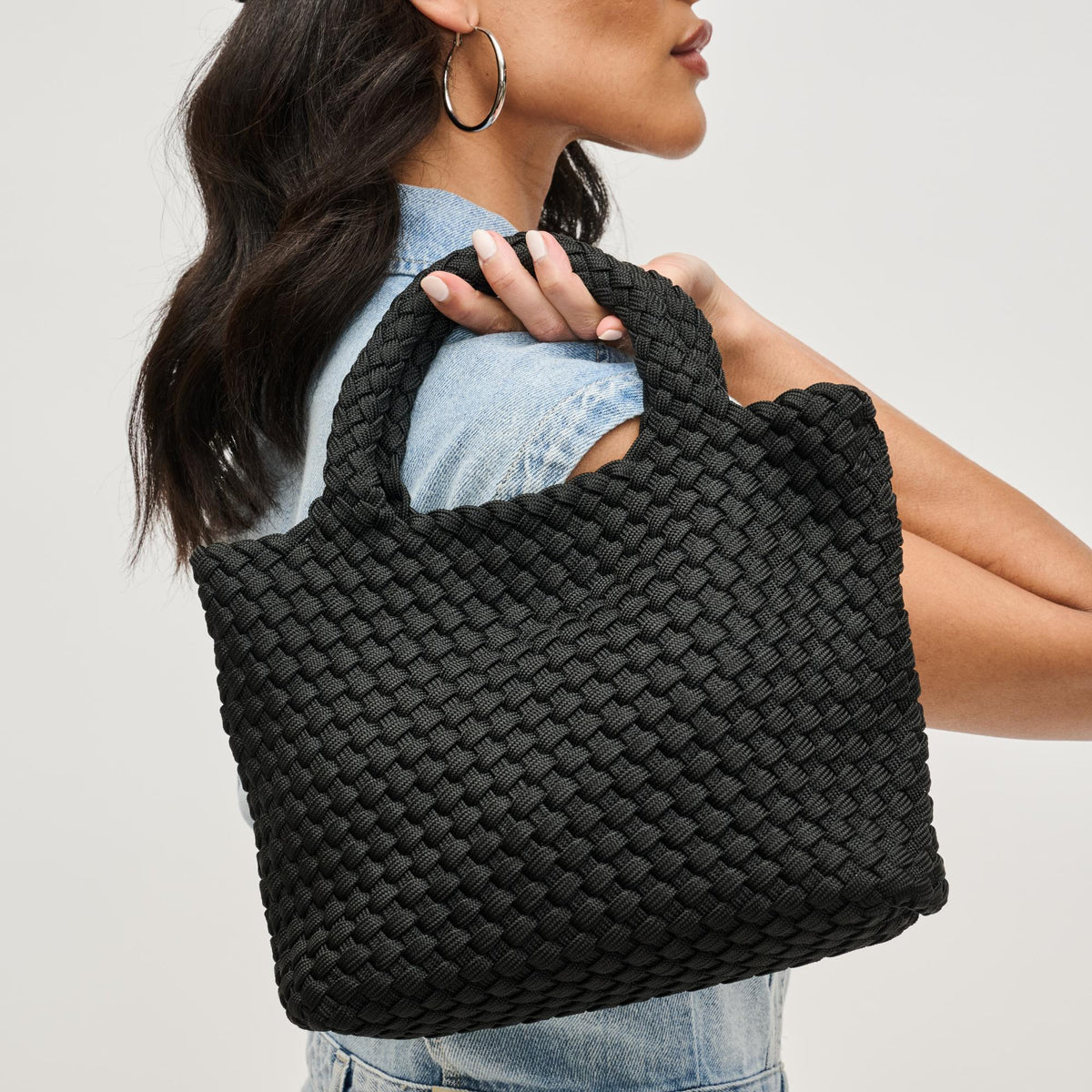 Woman wearing Black Sol and Selene Sky's The Limit - Small Laced Up Eco-Edition Crossbody 841764111690 View 1 | Black