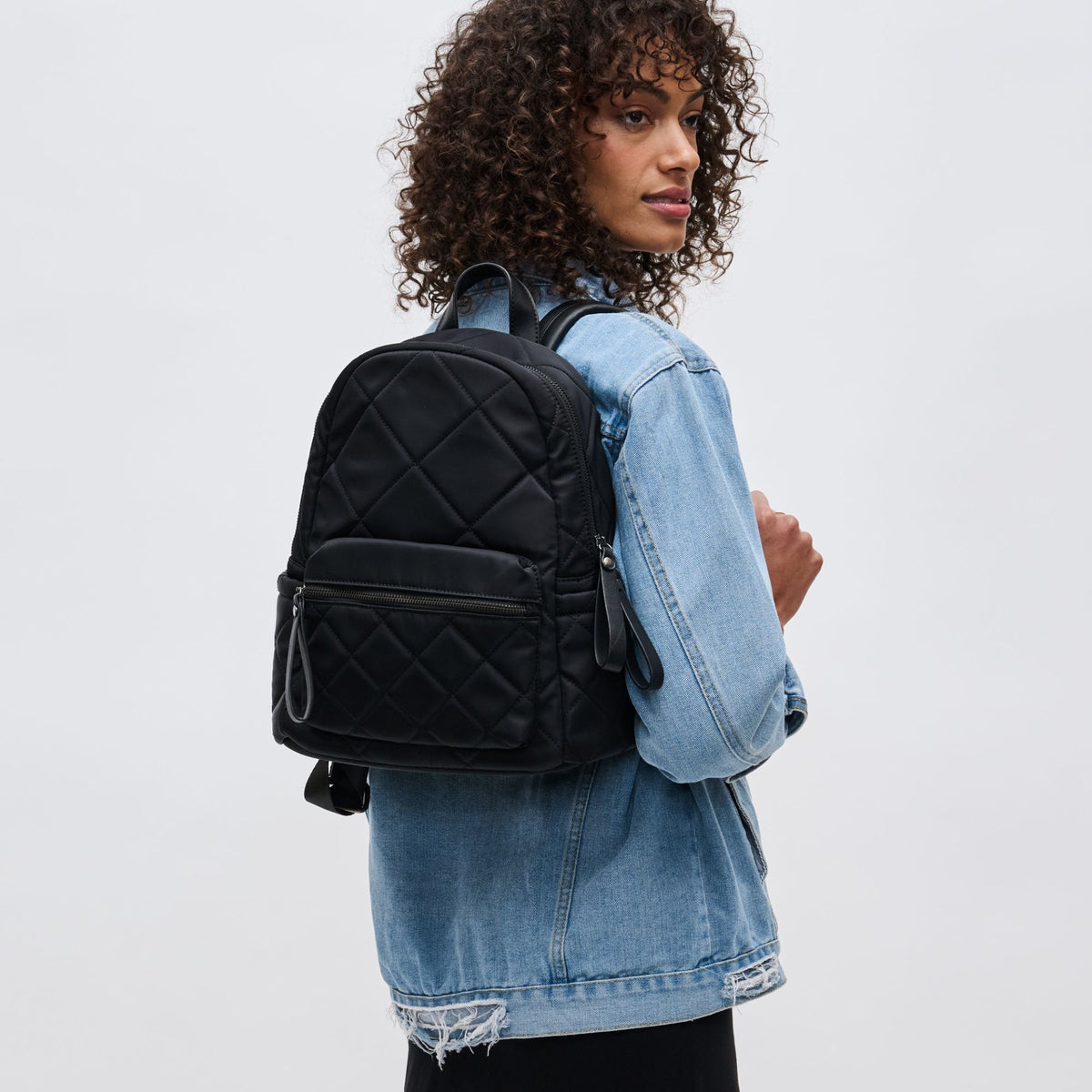 Woman wearing Black Sol and Selene Motivator - Small Backpack 841764101585 View 1 | Black