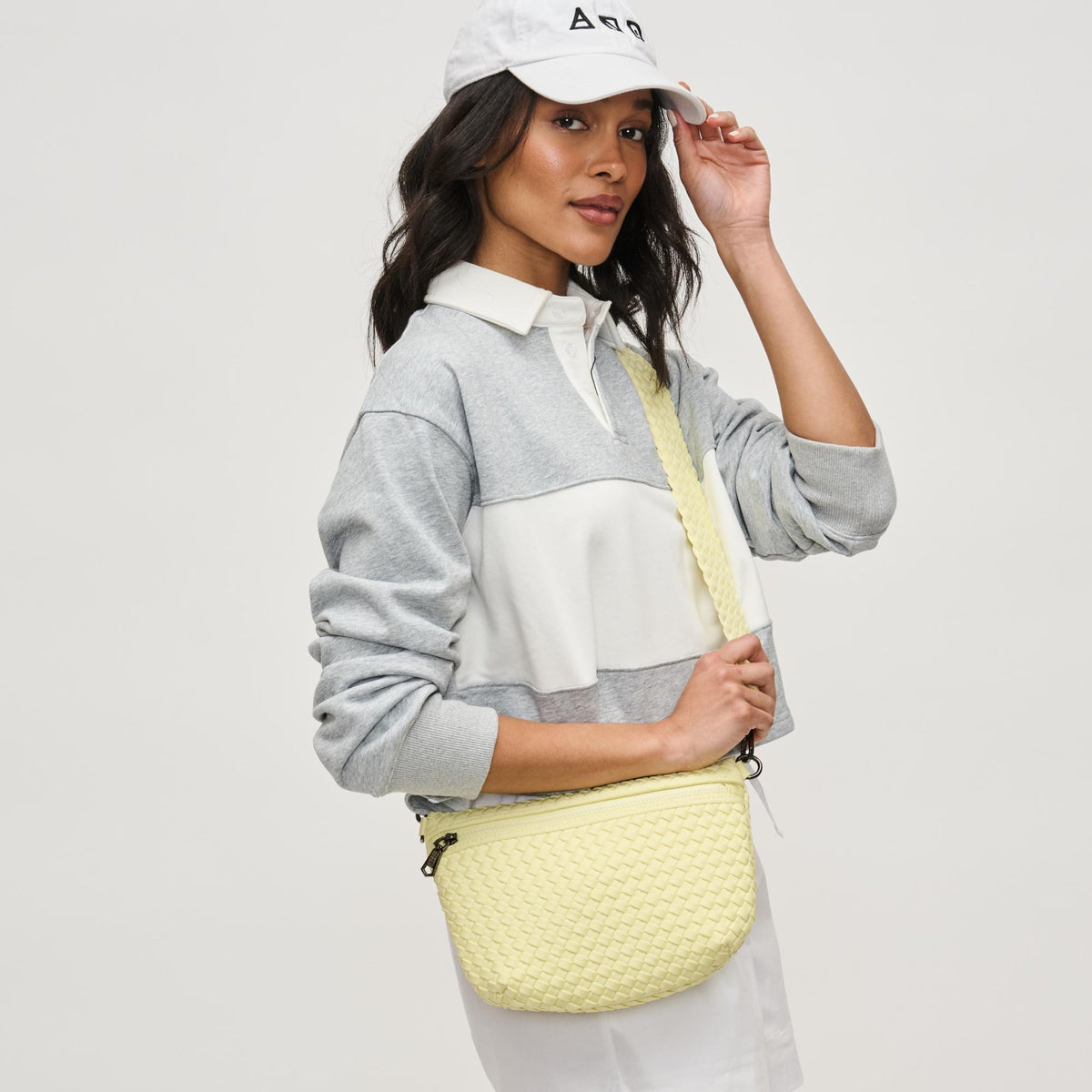 Woman wearing Butter Sol and Selene Ethereal - Woven Neoprene Crossbody 841764111461 View 1 | Butter