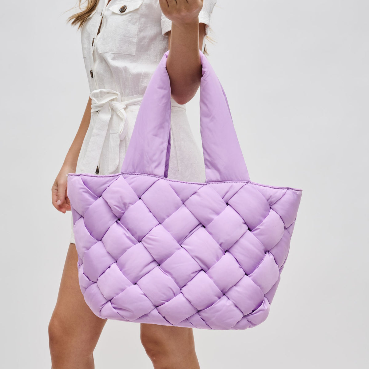 Woman wearing Lilac Sol and Selene Intuition East West Tote 841764107884 View 1 | Lilac