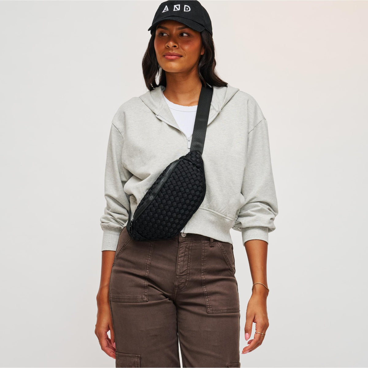 Woman wearing Black Sol and Selene Aim High Belt Bag 841764108102 View 1 | Black