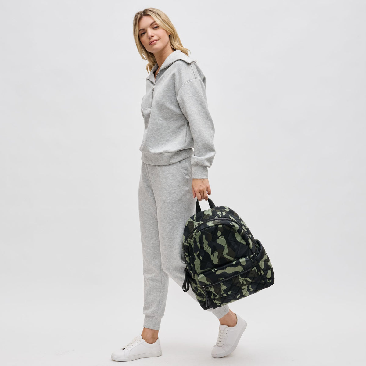 Woman wearing Camo Sol and Selene Motivator - Large Travel Backpack 841764106580 View 4 | Camo