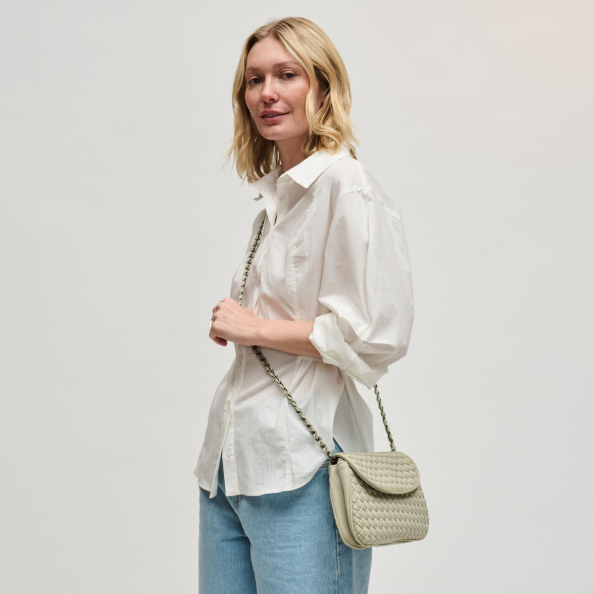 Woman wearing Sage Sol and Selene Astra Shoulder Bag 841764112451 View 2 | Sage