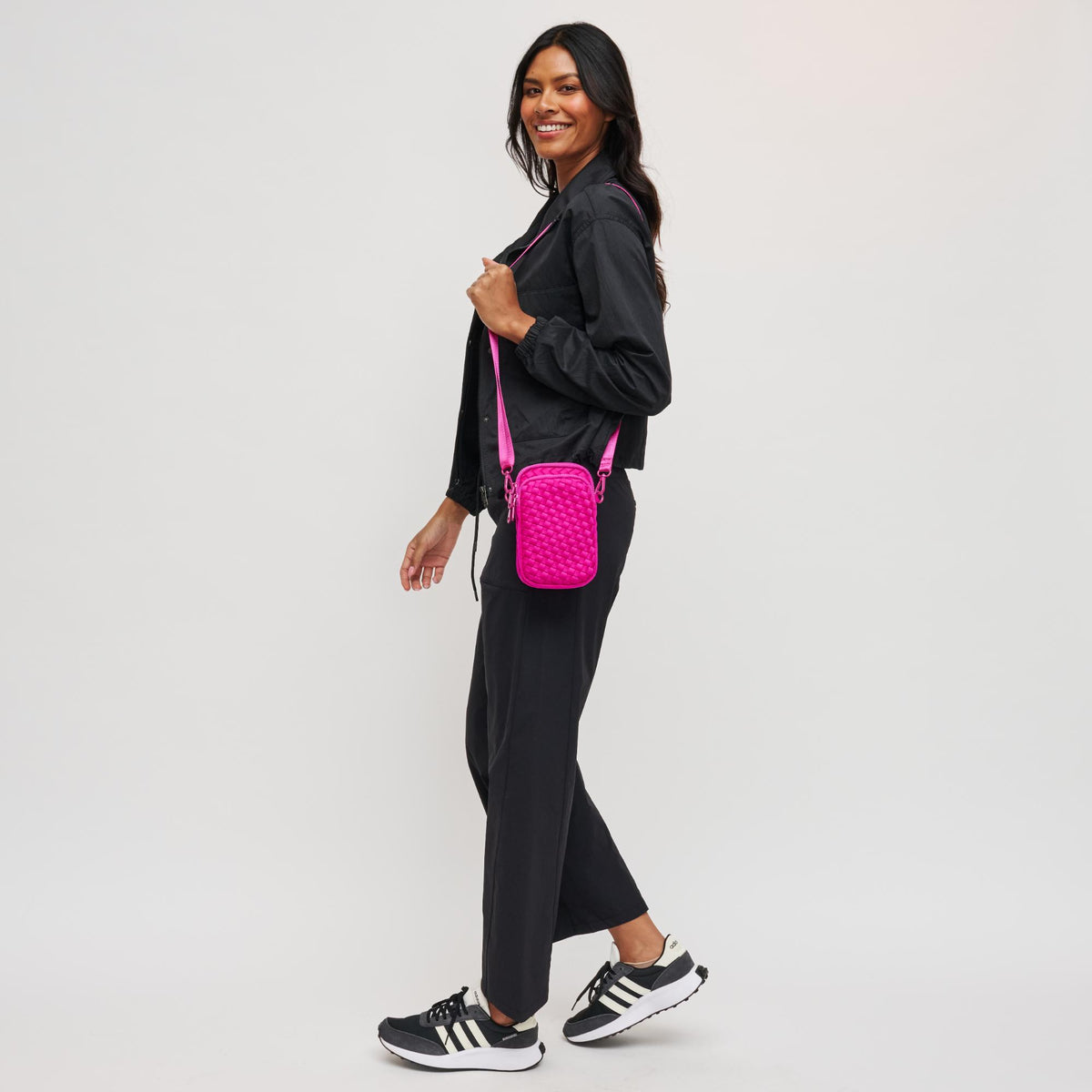 Woman wearing Fuchsia Sol and Selene Divide & Conquer - Woven Neoprene Crossbody 841764108720 View 2 | Fuchsia