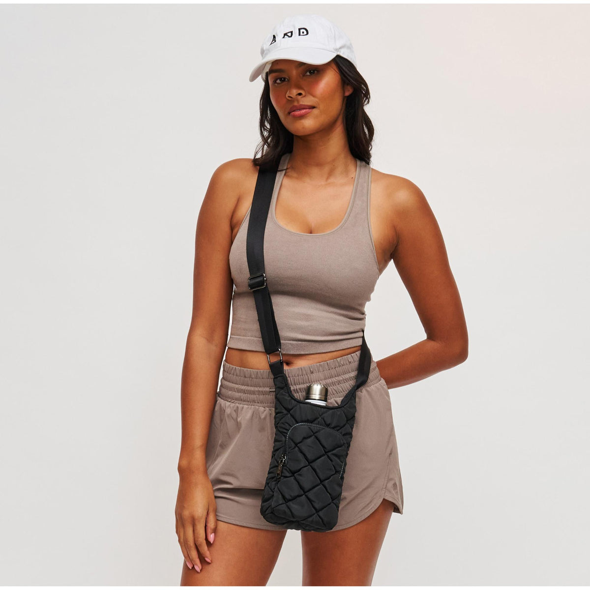 Woman wearing Black Sol and Selene Let It Flow - Puffer Crossbody 841764112062 View 2 | Black