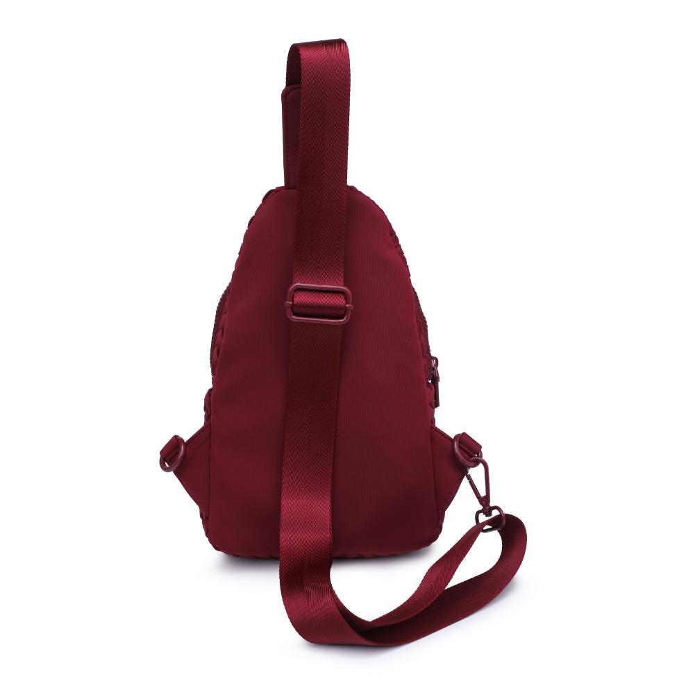 Woman wearing Wine Sol and Selene Beyond The Horizon - Woven Neoprene Sling Backpack 841764110457 View 7 | Wine