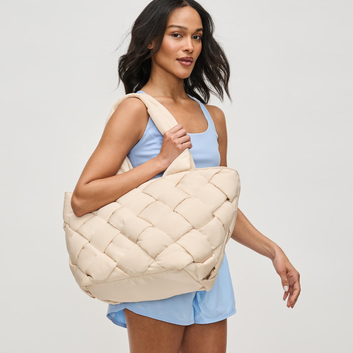 Woman wearing Cream Sol and Selene Intuition East West Tote 841764111843 View 2 | Cream