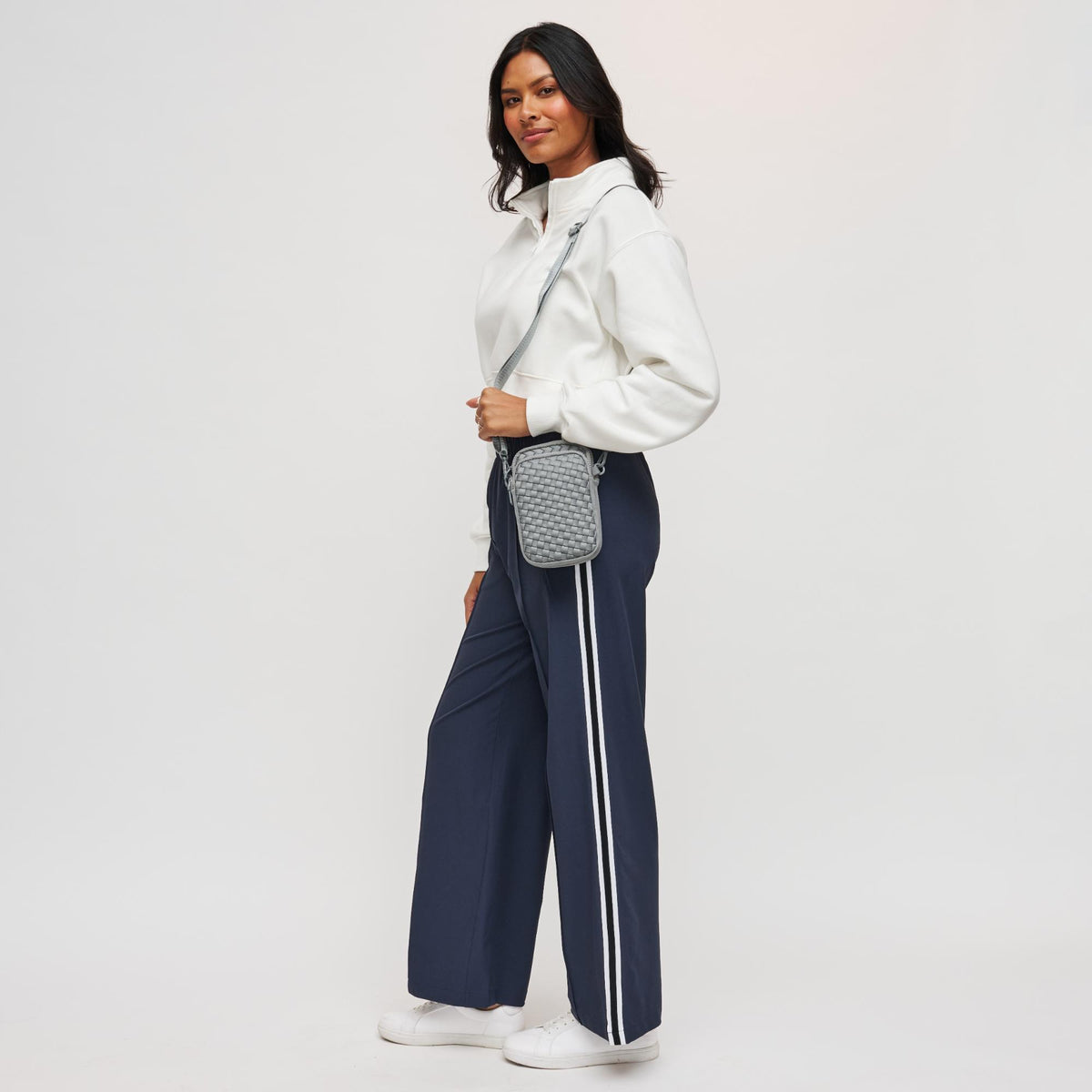 Woman wearing Grey Sol and Selene Divide & Conquer - Woven Neoprene Crossbody 841764108737 View 3 | Grey