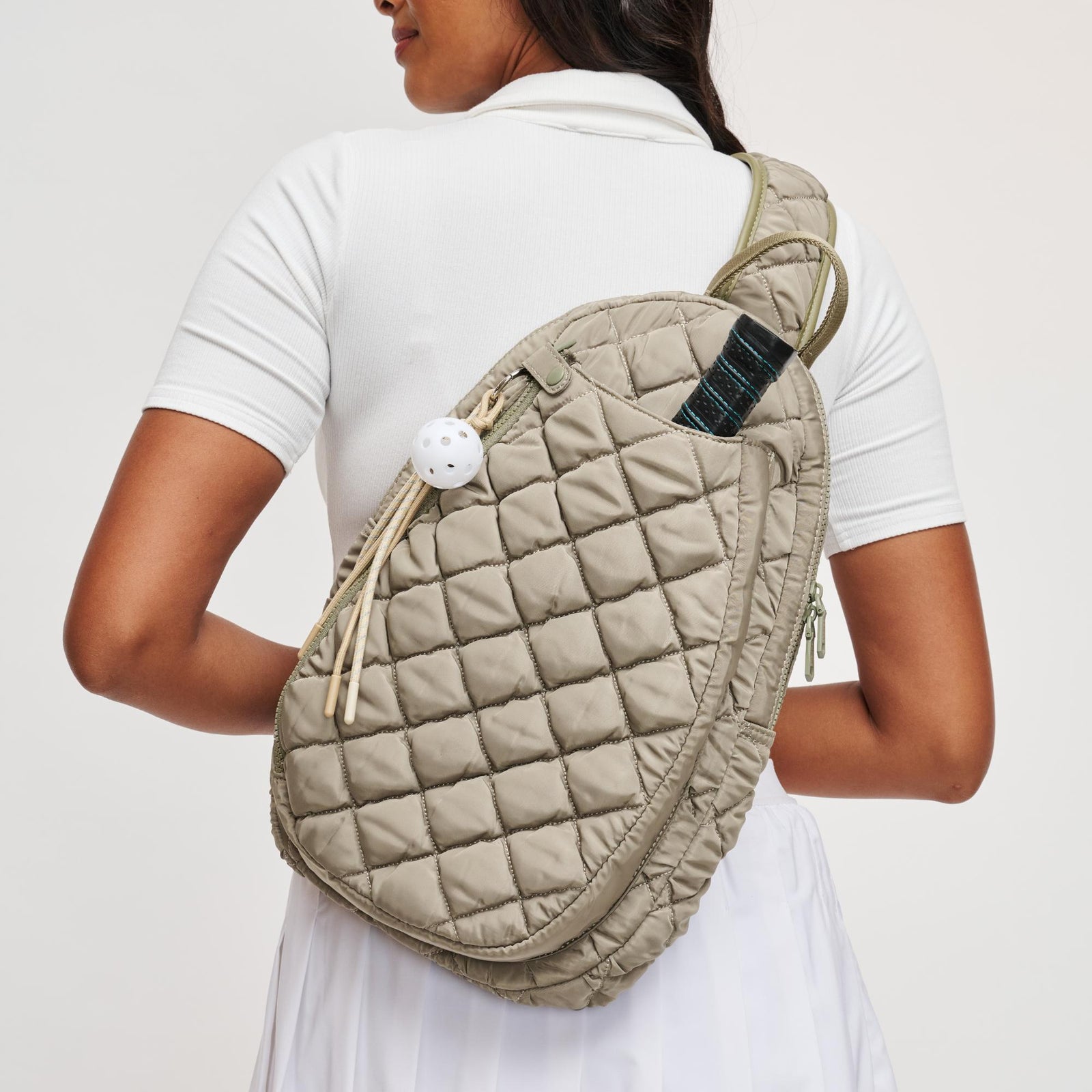 Woman wearing Black Sol and Selene Match Point - Quilted Puffer Pickleball & Paddle Tennis Sling Backpack 841764111973 View 1 | Black