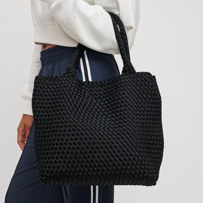 Woman wearing Black Sol and Selene Sky's The Limit - Medium Tote 841764107778 View 1 | Black