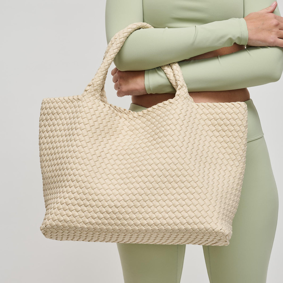 Woman wearing Cream Sol and Selene Sky's The Limit - Large Tote 841764109253 View 1 | Cream