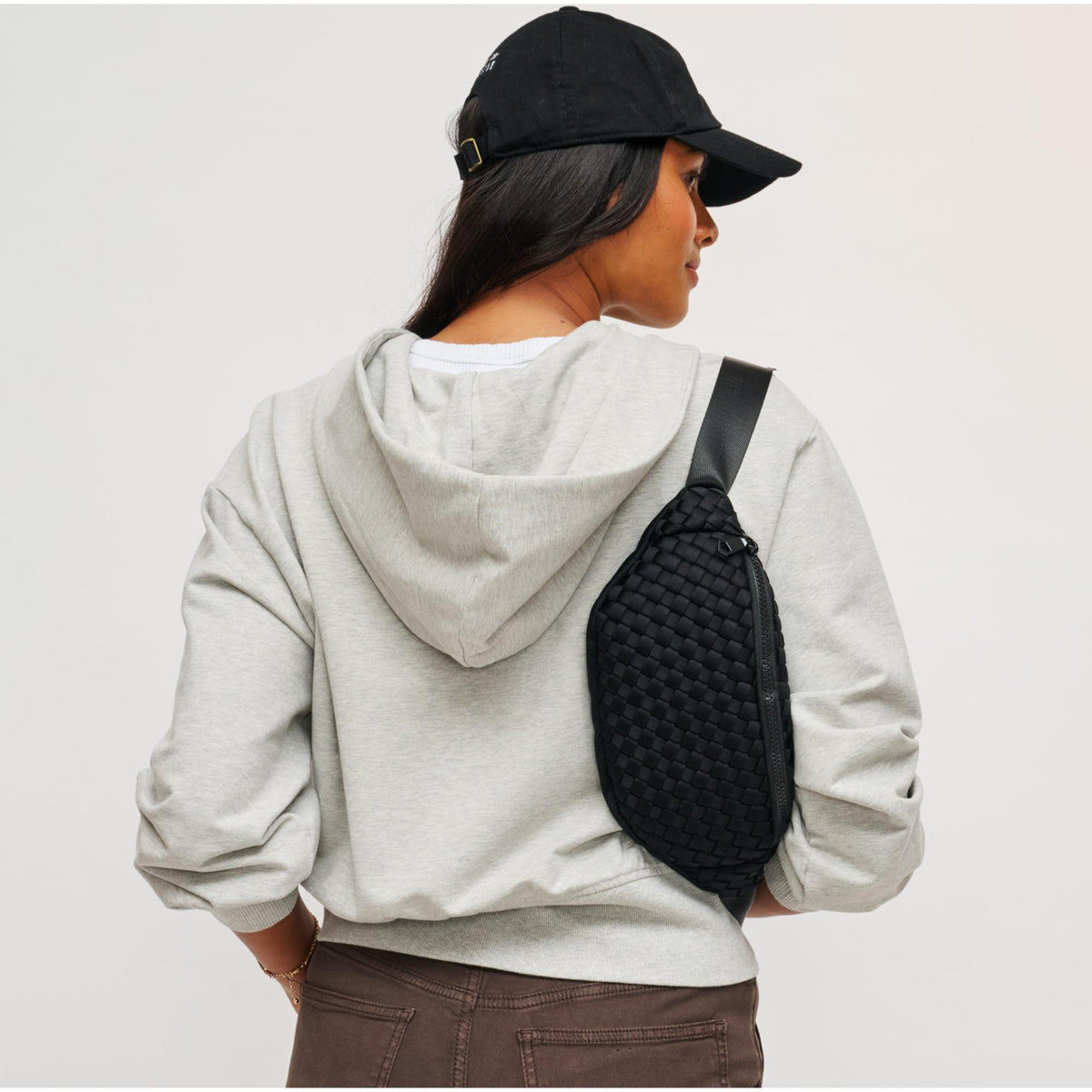 Woman wearing Black Sol and Selene Aim High Belt Bag 841764108102 View 2 | Black