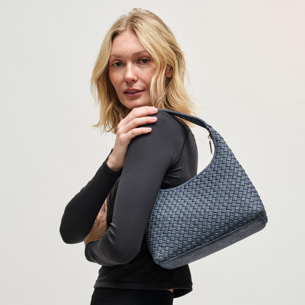 Woman wearing Dark Denim Sol and Selene Harmonia - Woven Vegan Leather Shoulder Bag 841764112550 View 3 | Dark Denim
