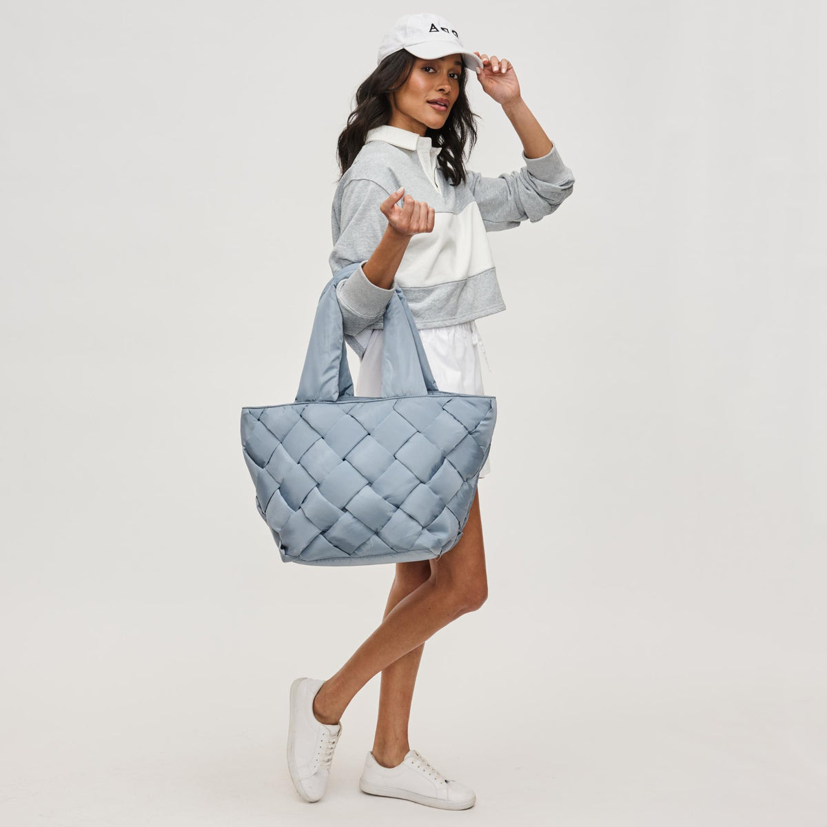 Woman wearing Slate Sky Sol and Selene Intuition East West Tote 841764111867 View 3 | Slate Sky