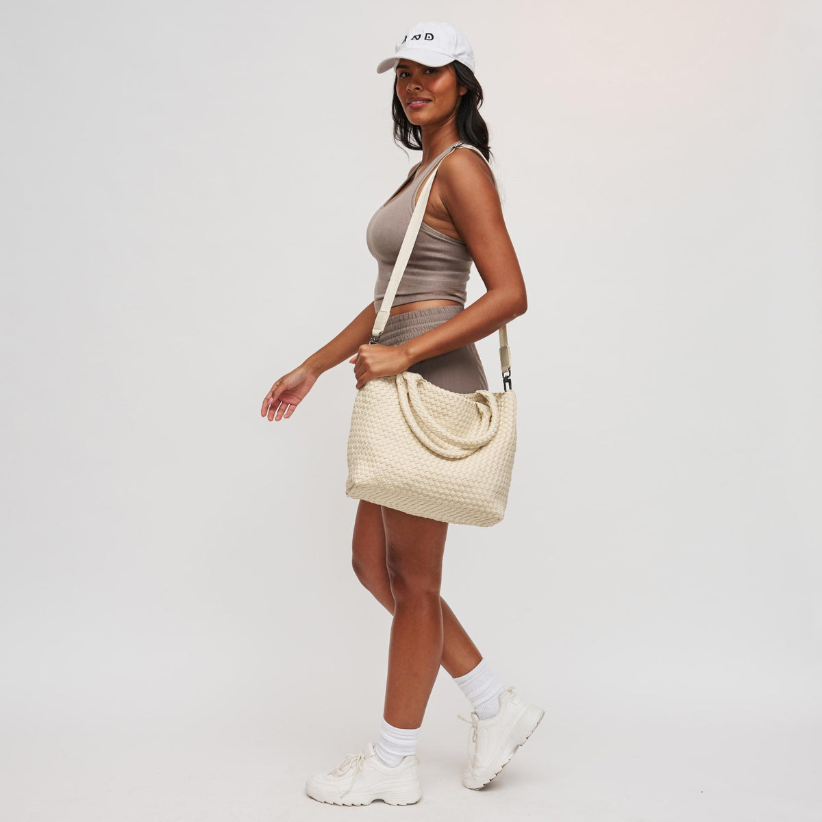 Woman wearing Cream Sol and Selene Sky's The Limit - Medium Tote 841764109246 View 4 | Cream