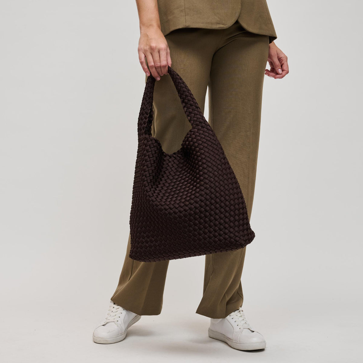 Woman wearing Chocolate Sol and Selene Celestial Woven Neoprene Hobo 841764112314 View 3 | Chocolate