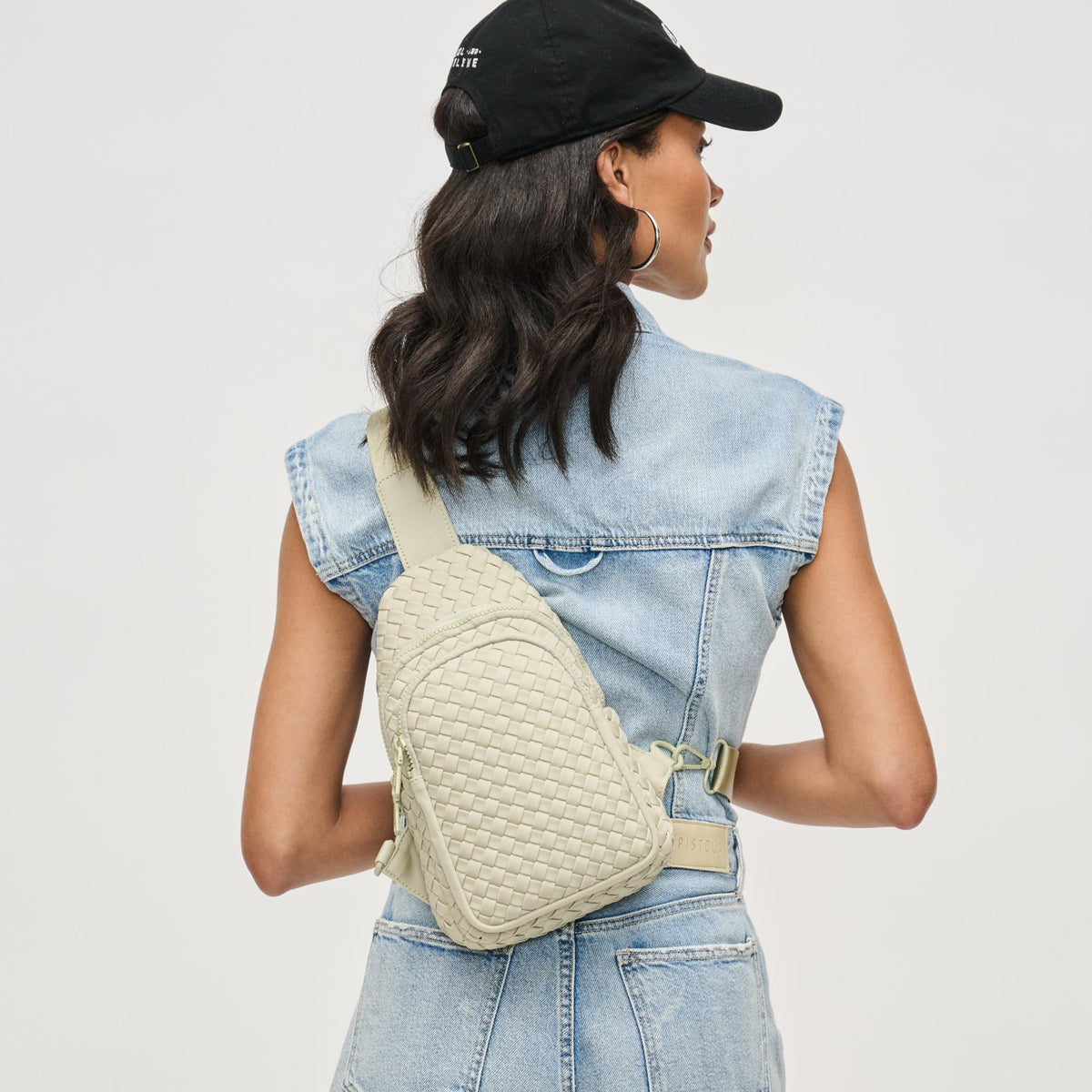 Woman wearing Sage Sol and Selene Beyond The Horizon - Woven Neoprene Sling Backpack 841764109086 View 3 | Sage