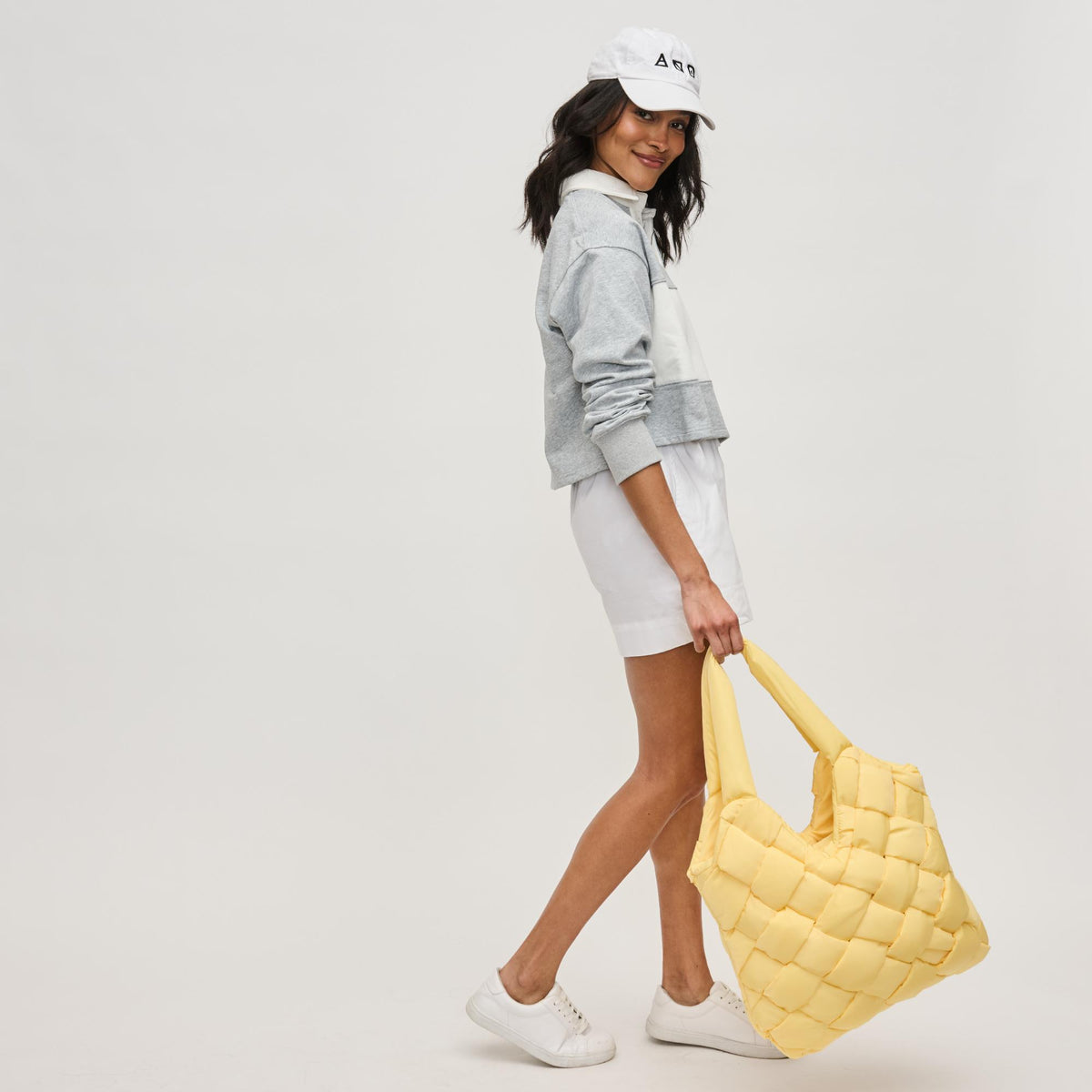 Woman wearing Butter Sol and Selene Illumine Tote 841764111904 View 3 | Butter