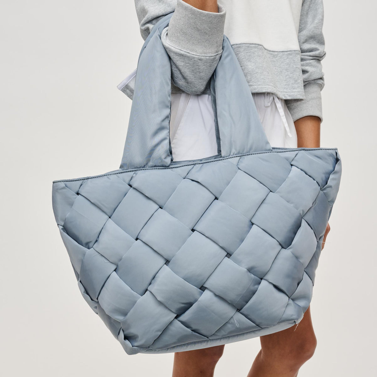 Woman wearing Slate Sky Sol and Selene Intuition East West Tote 841764111867 View 4 | Slate Sky
