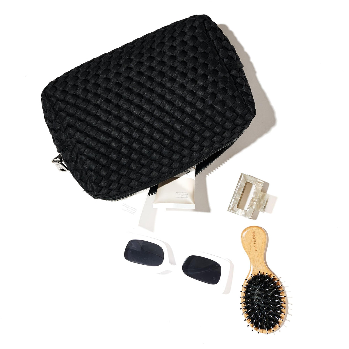 Woman wearing Black Sol and Selene Altitude - Woven Neoprene Cosmetic & Travel Organizer Pouch 841764112130 View 1 | Black